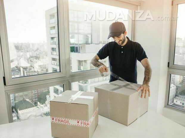 delivery-man-packing-cardboard-box-768x512.jpg